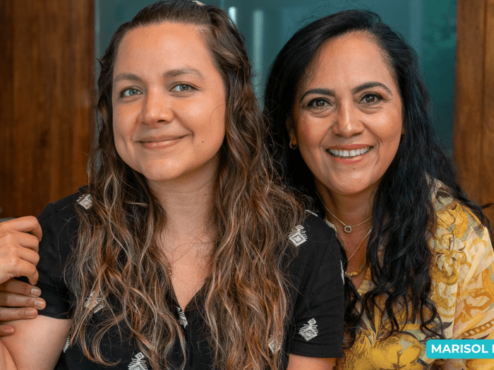 Two women smiling